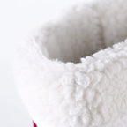 Chauffe-pied blanc et rouge
