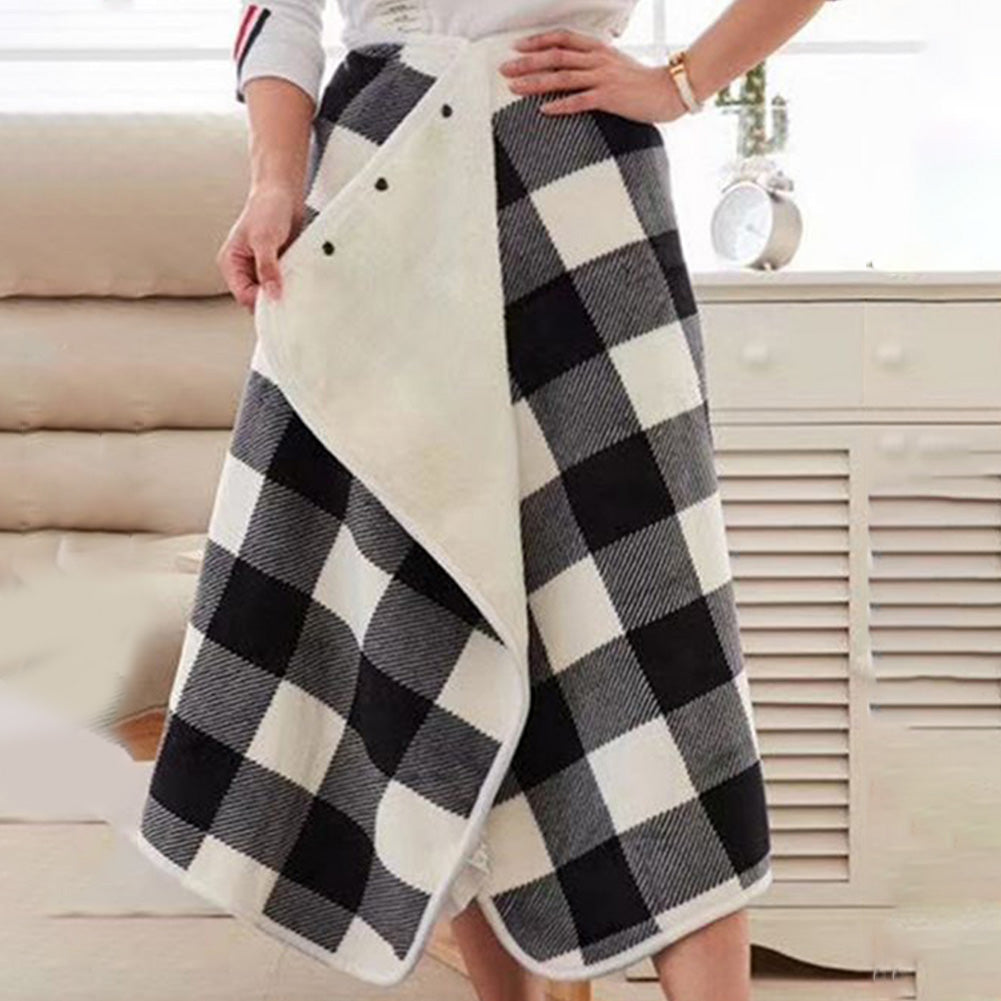 Poncho chauffant à carreaux